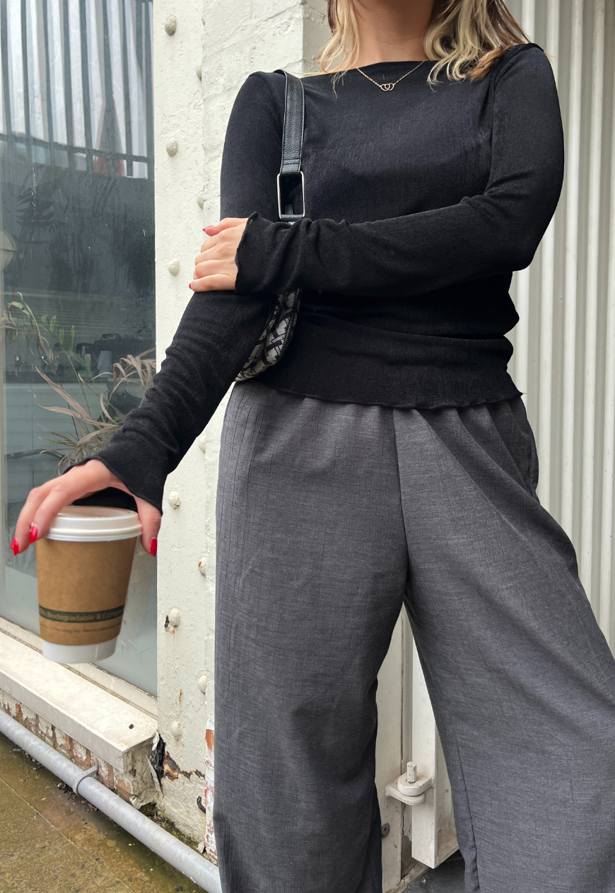 black slinky sleeved top