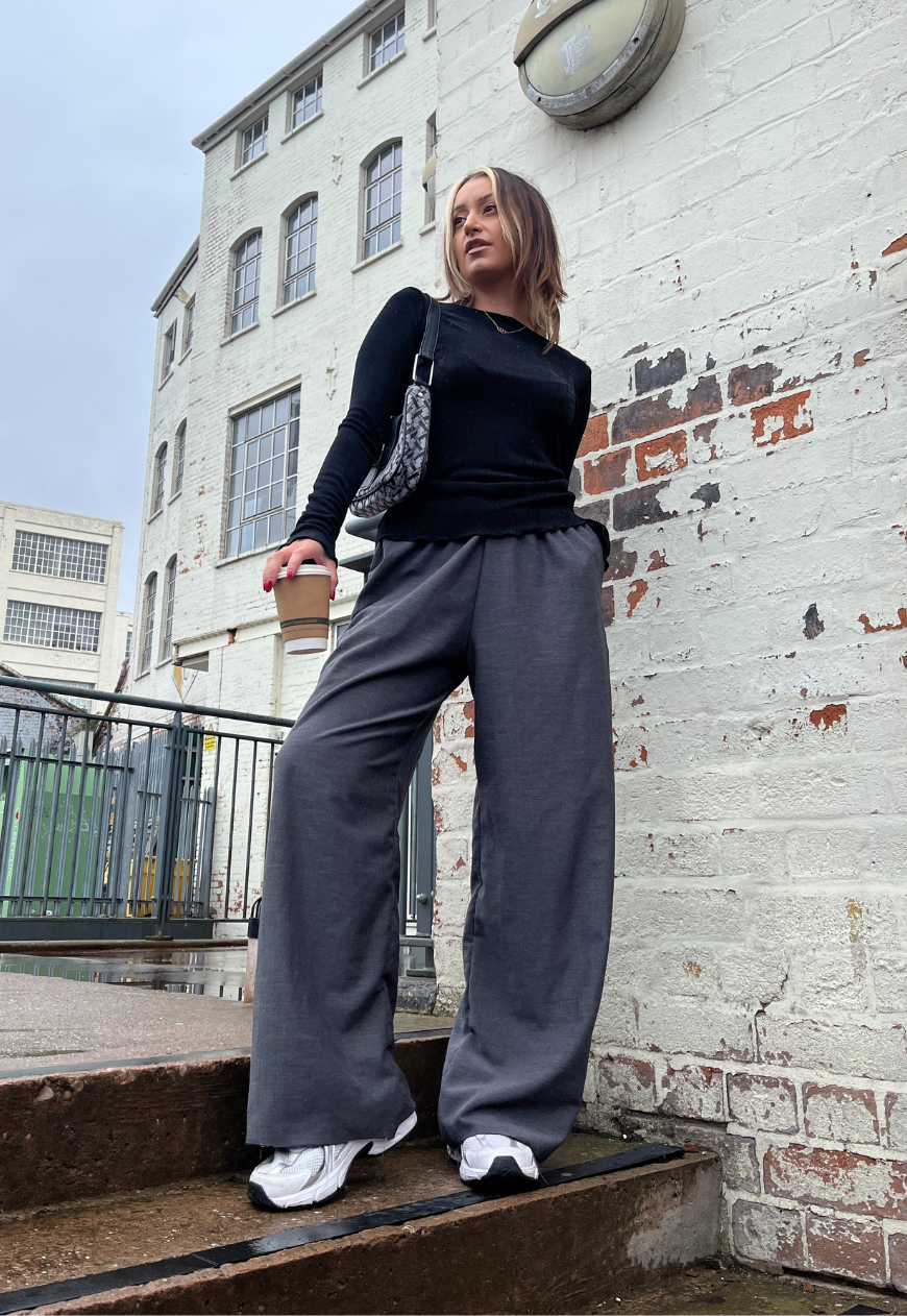 black slinky sleeved top