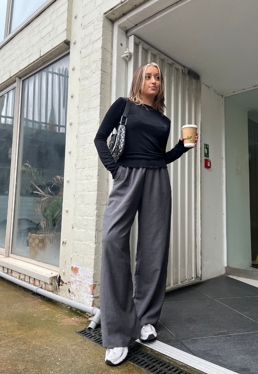 black slinky sleeved top