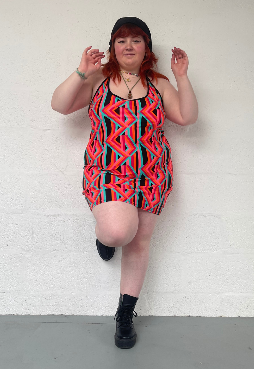ORANGE PRINT HALTER DRESS - XS HISSY FIT LTD