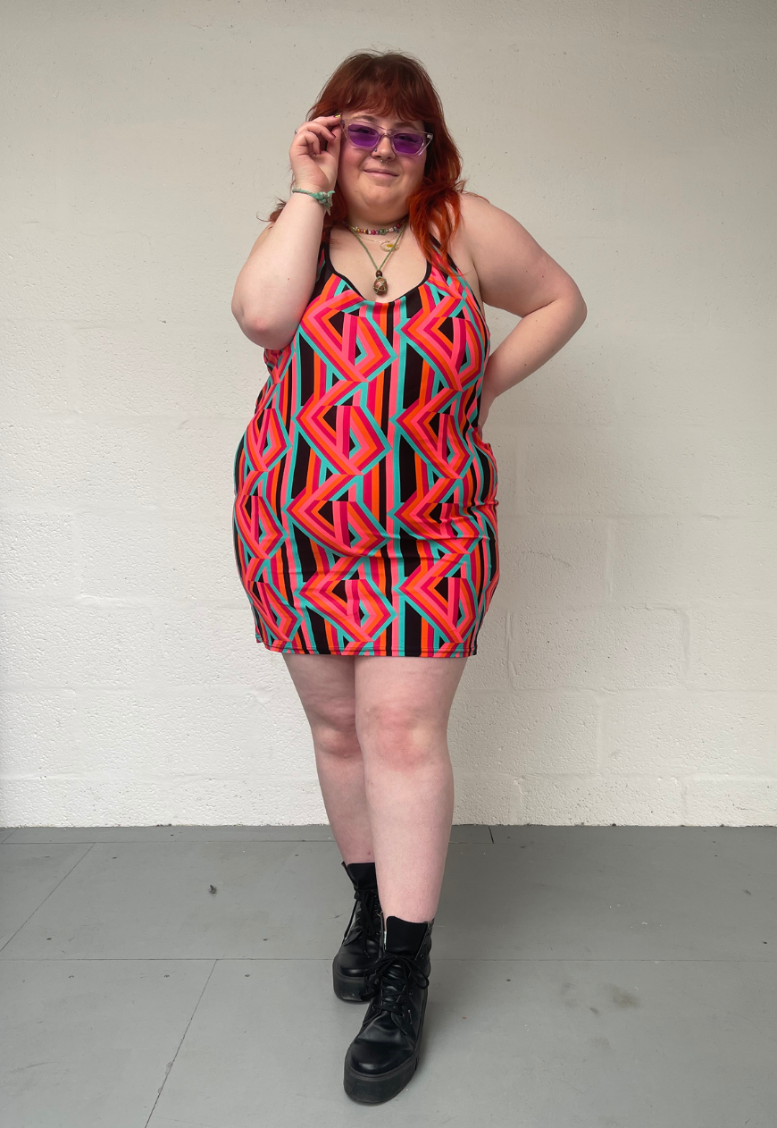 ORANGE PRINT HALTER DRESS - XS HISSY FIT LTD