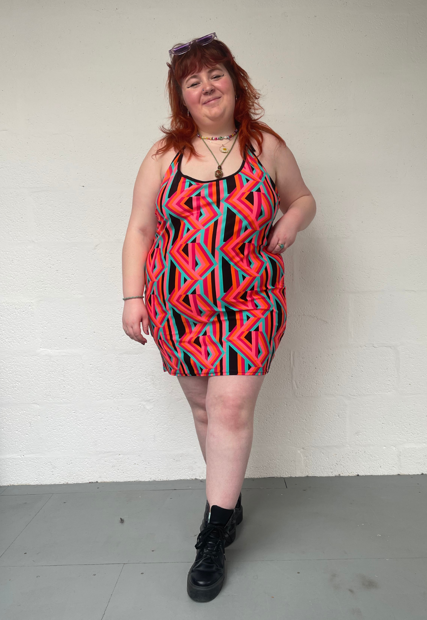 ORANGE PRINT HALTER DRESS - XS HISSY FIT LTD