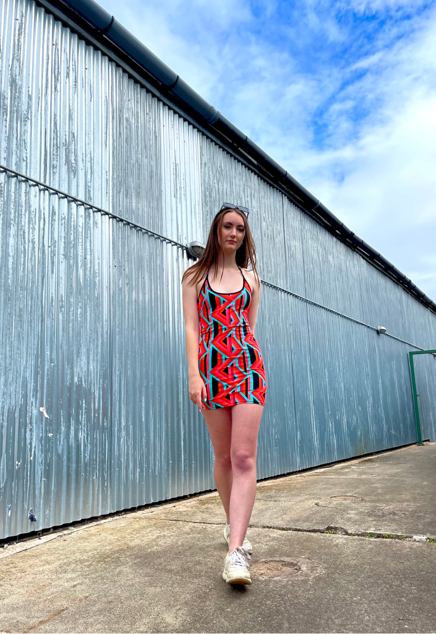 ORANGE PRINT HALTER DRESS - XS HISSY FIT LTD