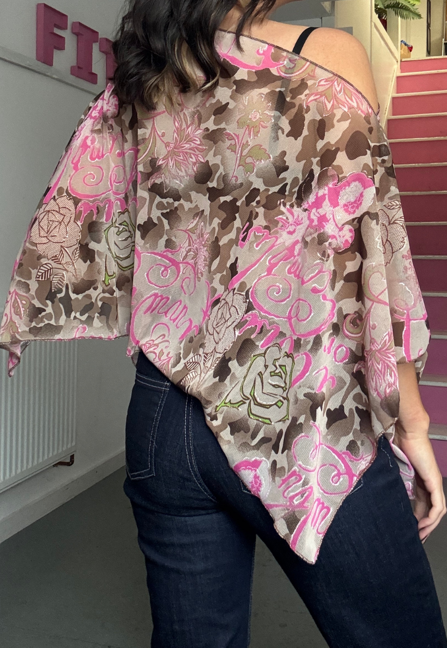 pink writing poncho