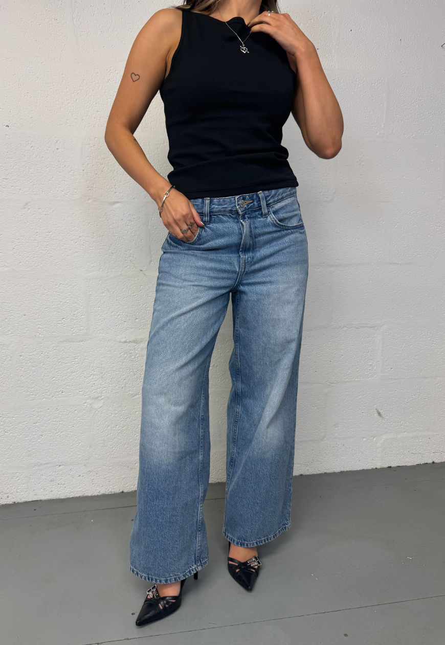 black slash neck top