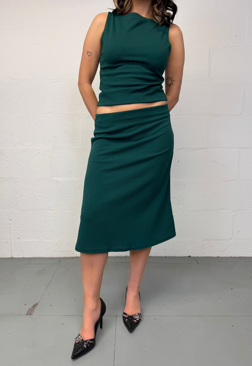 green slash neck top